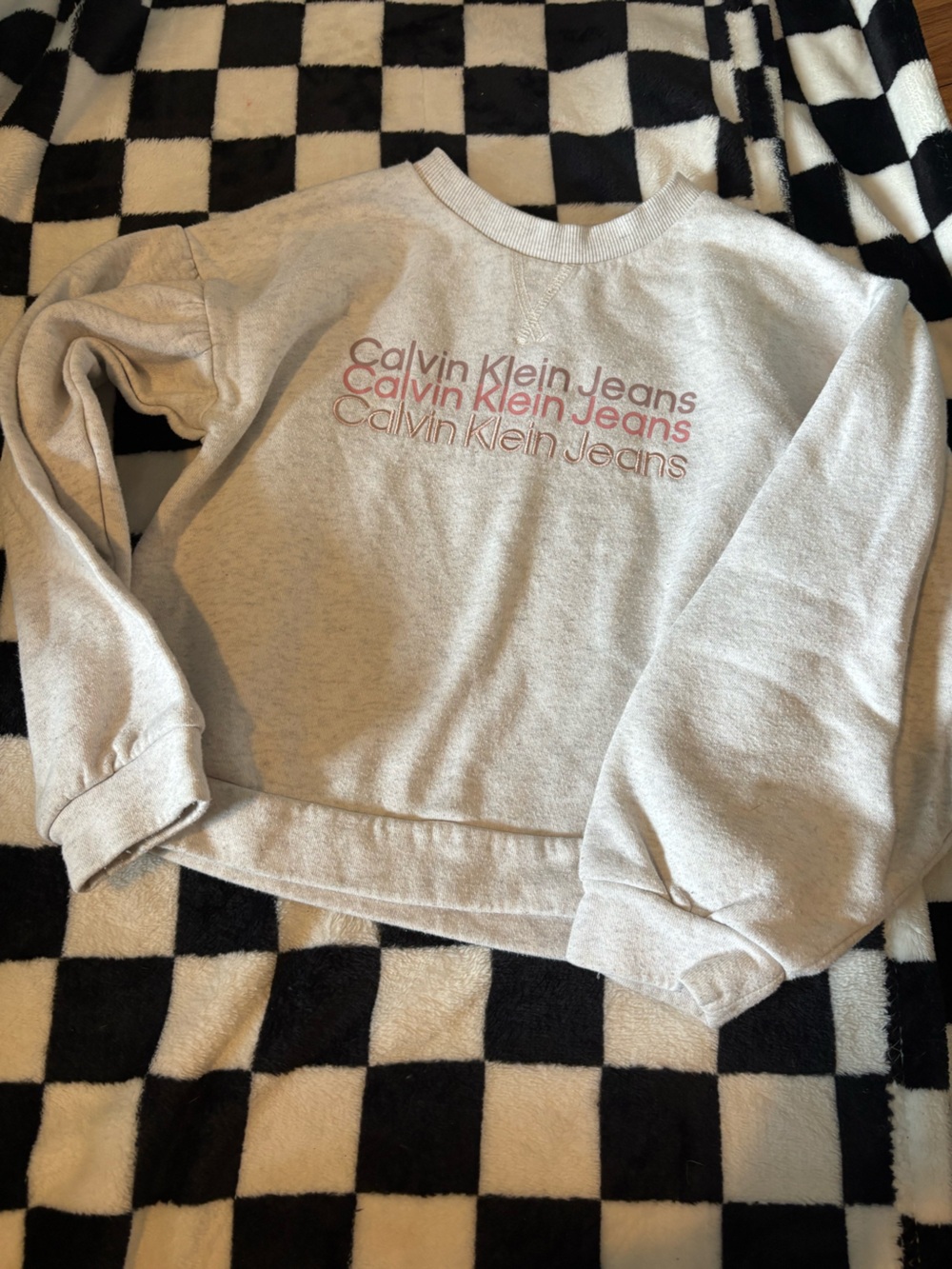 Size 7 Calvin Klein crew neck (small stain